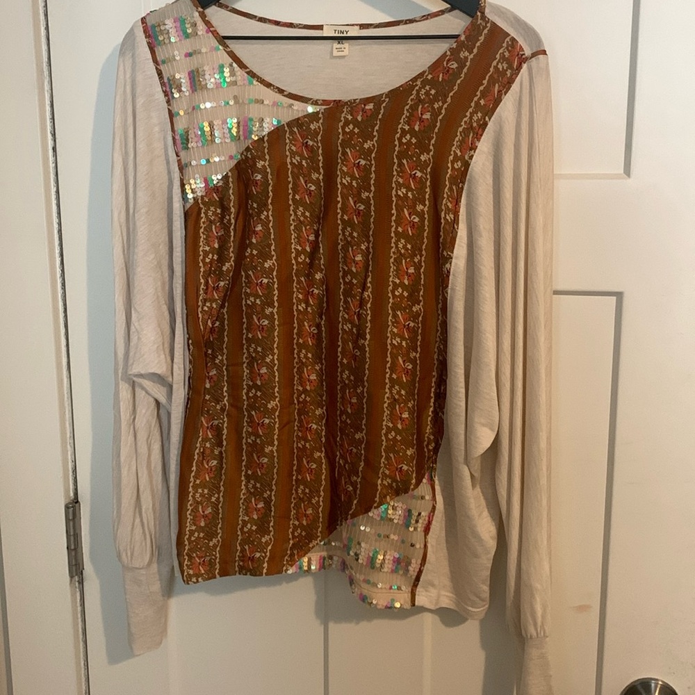 tiny long sleeve shirt with sequins and patterned patch